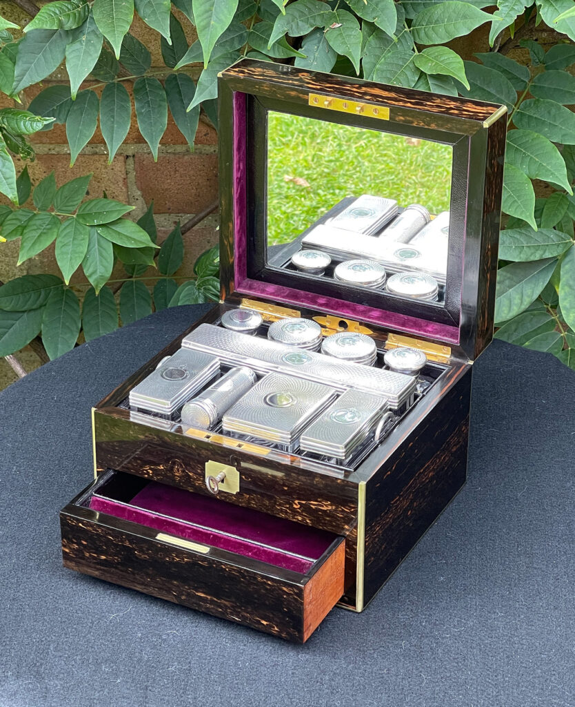Front right internal view of a Miniature Antique Gentleman’s Dressing Case in Calamander with lower drawer open.
