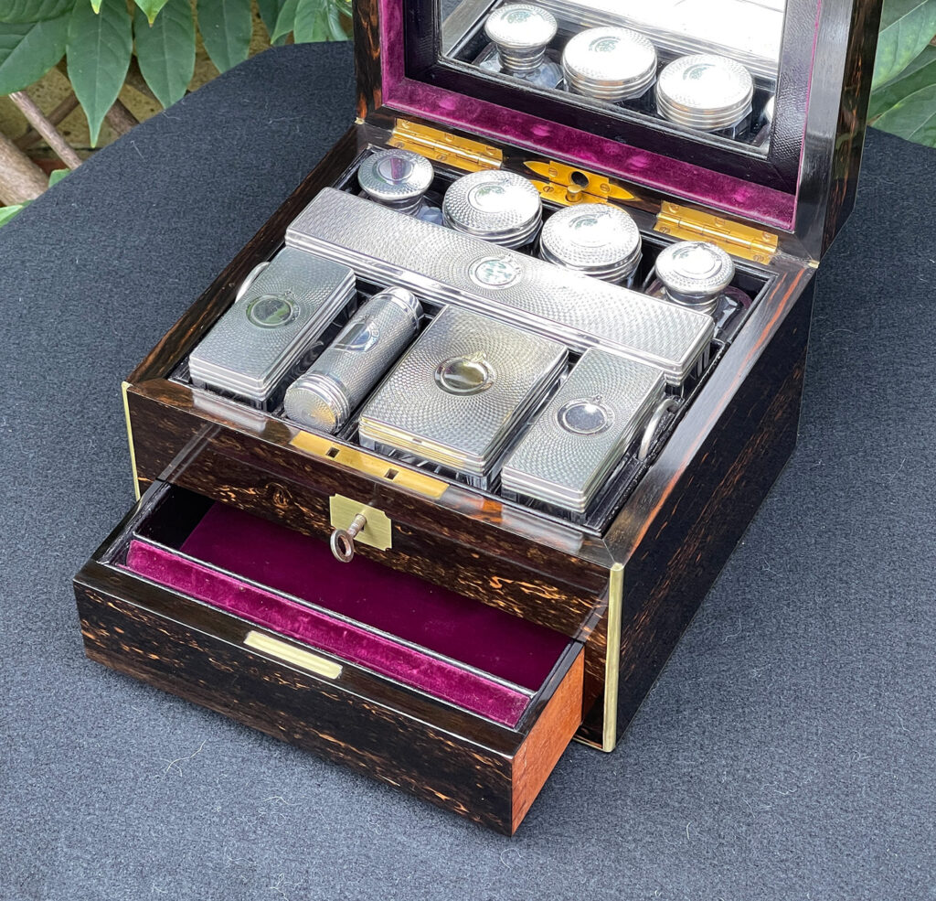 Overhead internal view of a Miniature Antique Gentleman’s Dressing Case in Calamander.