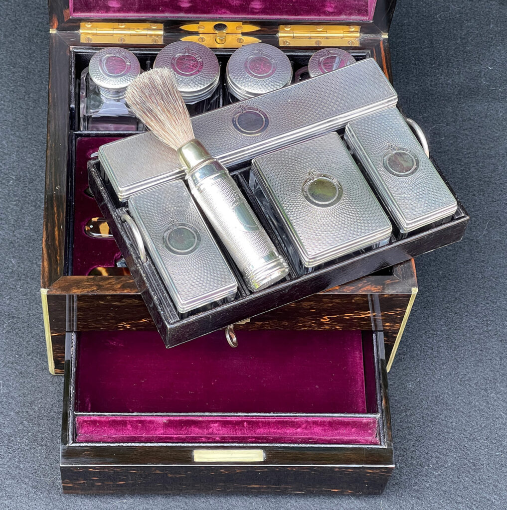 Close up internal view of a Miniature Antique Gentleman’s Dressing Case in Calamander with top tray removed.