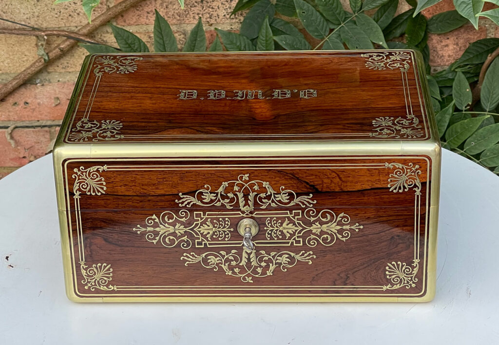 Front view of a French Antique Jewellery Box in Rosewood with Delicate Brass Inlay, by Aucoc Ainé.