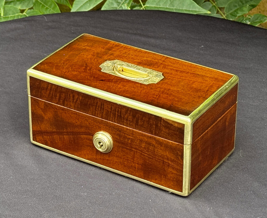 Front right view of a Miniature Antique Jewellery Box in Solid Mahogany.
