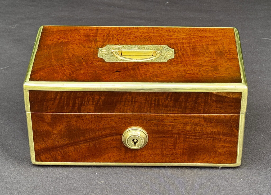 Front view of a Miniature Antique Jewellery Box in Solid Mahogany.