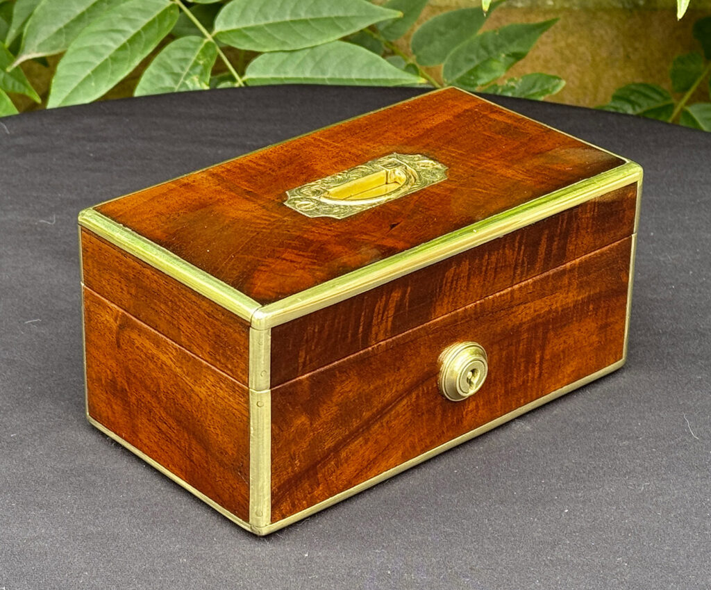 Front left view of a Miniature Antique Jewellery Box in Solid Mahogany.