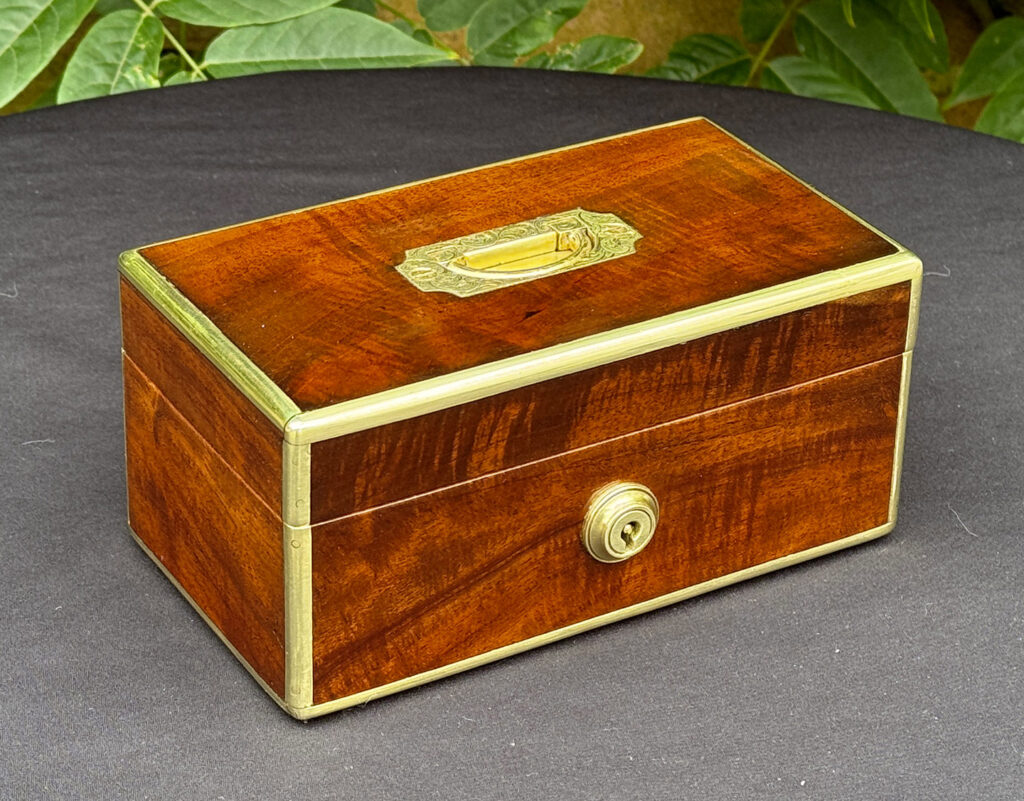 Front left view of a Miniature Antique Jewellery Box in Solid Mahogany.