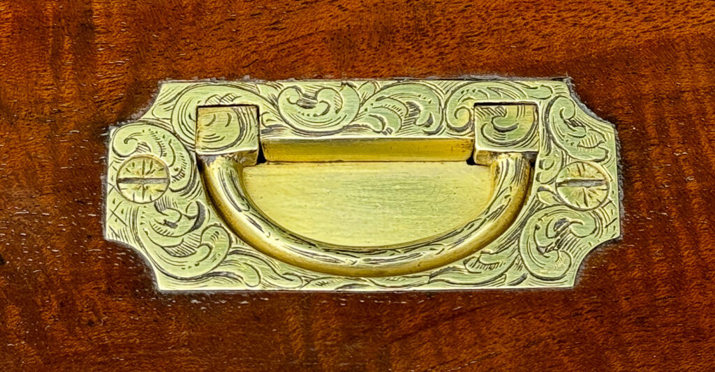 Close up of top handle from a Miniature Antique Jewellery Box in Solid Mahogany.