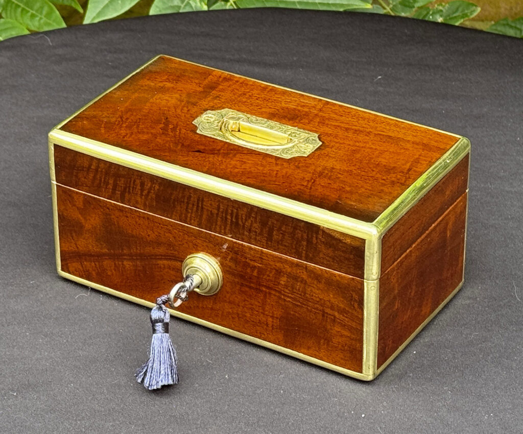 Front right view of a Miniature Antique Jewellery Box in Solid Mahogany.