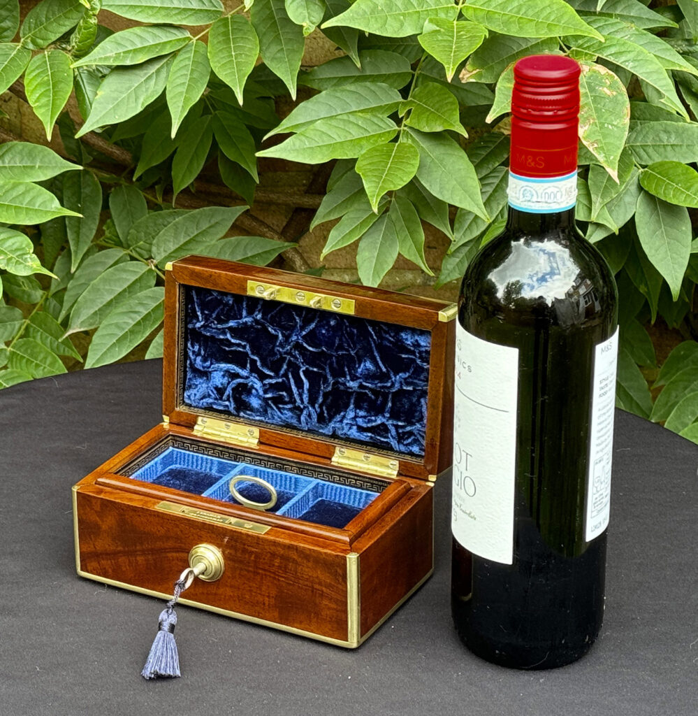 Size comparison of an open Miniature Antique Jewellery Box in Solid Mahogany.