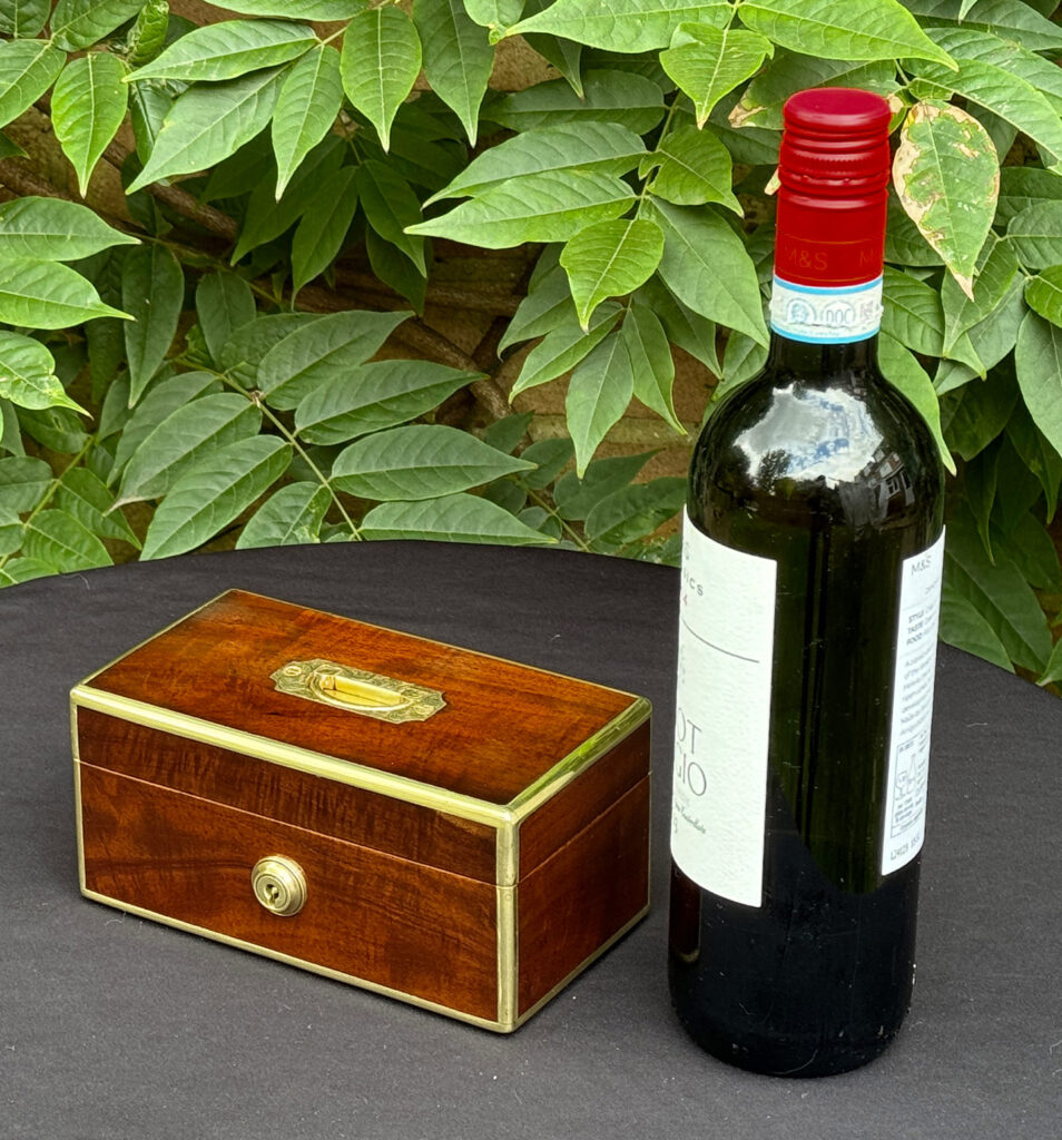Size comparison of a Miniature Antique Jewellery Box in Solid Mahogany.