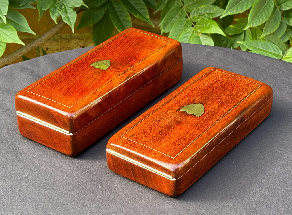 Rear left view of a Pair of Small French Antique Solid Mahogany Jewellery Boxes.