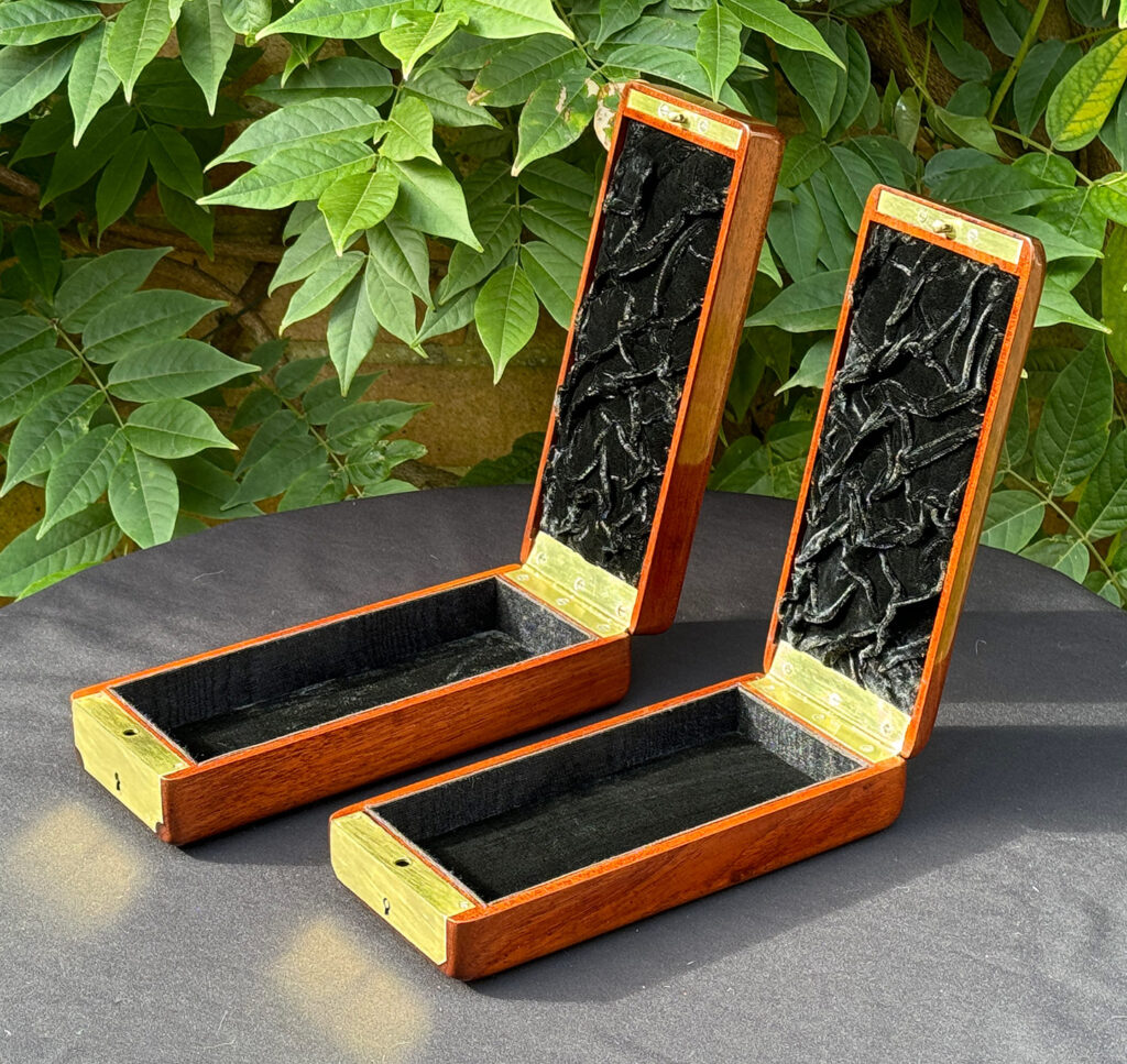 Right side internal view of a Pair of Small French Antique Solid Mahogany Jewellery Boxes.