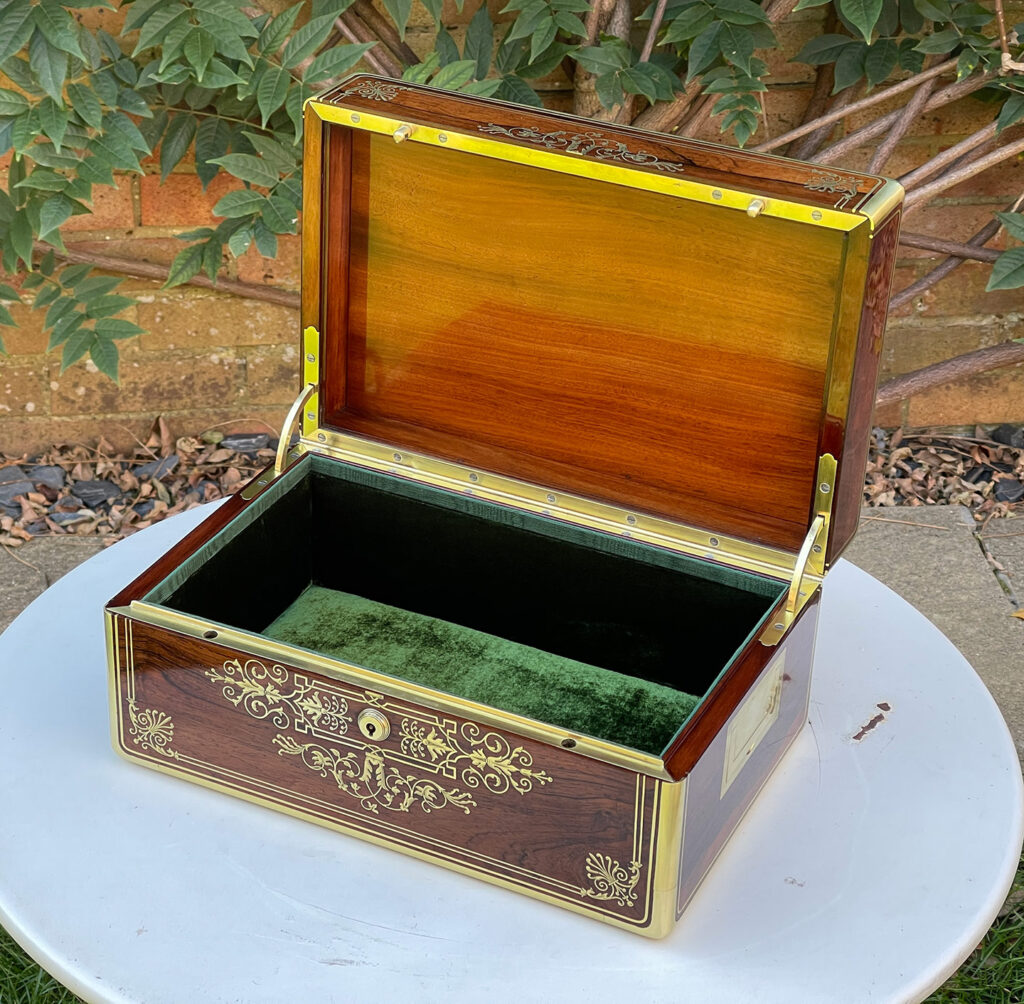 Front right internal view of a French Antique Jewellery Box in Rosewood with Delicate Brass Inlay, by Aucoc Ainé.