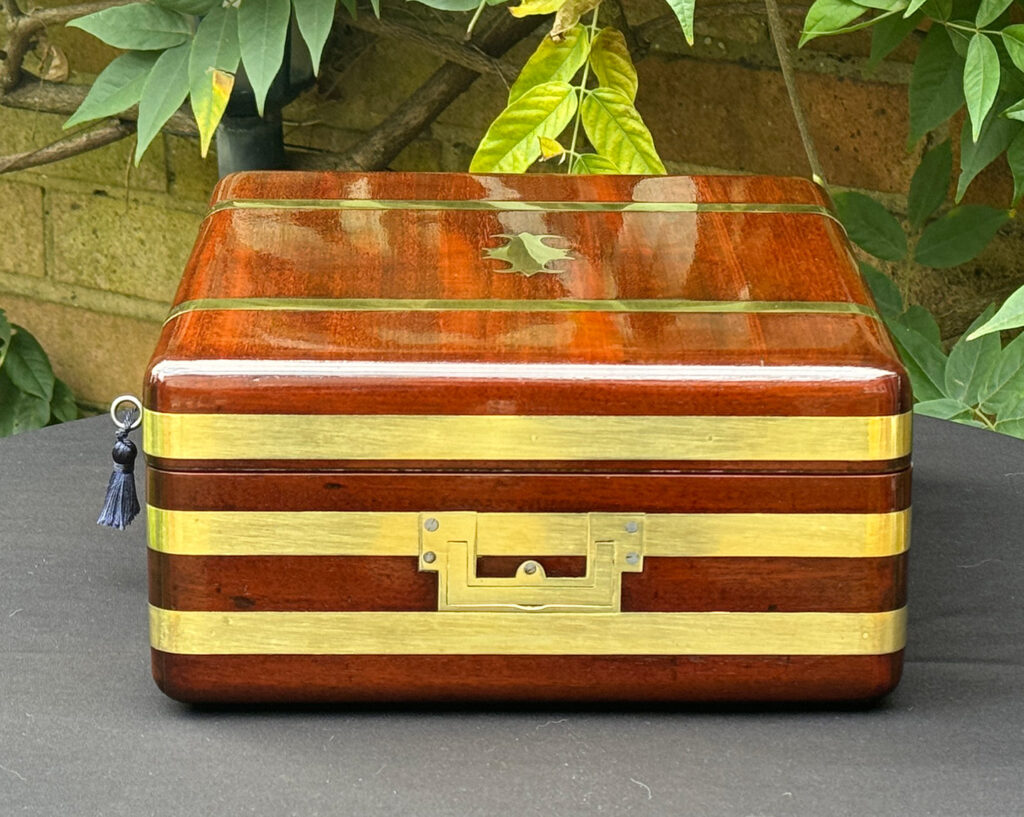 Right side view of an Antique Radial Edged Travelling Jewellery Box in Mahogany.