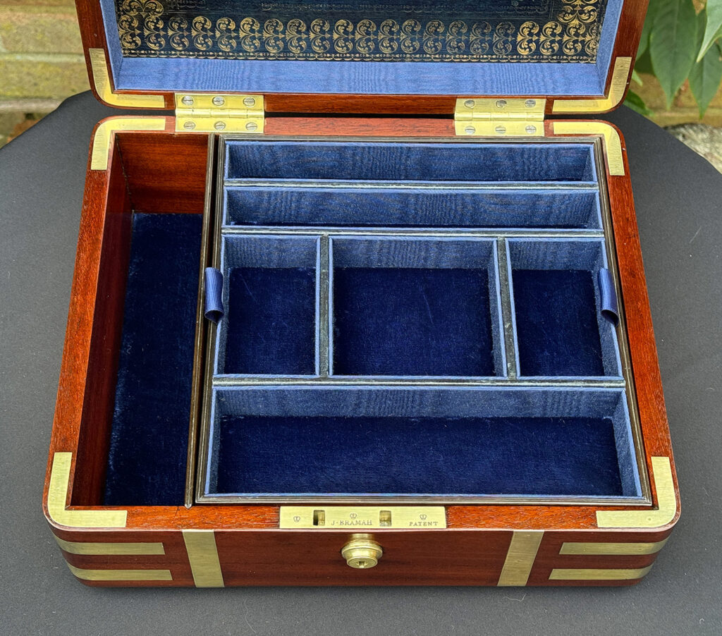Overhead internal view of an Antique Radial Edged Travelling Jewellery Box in Mahogany.