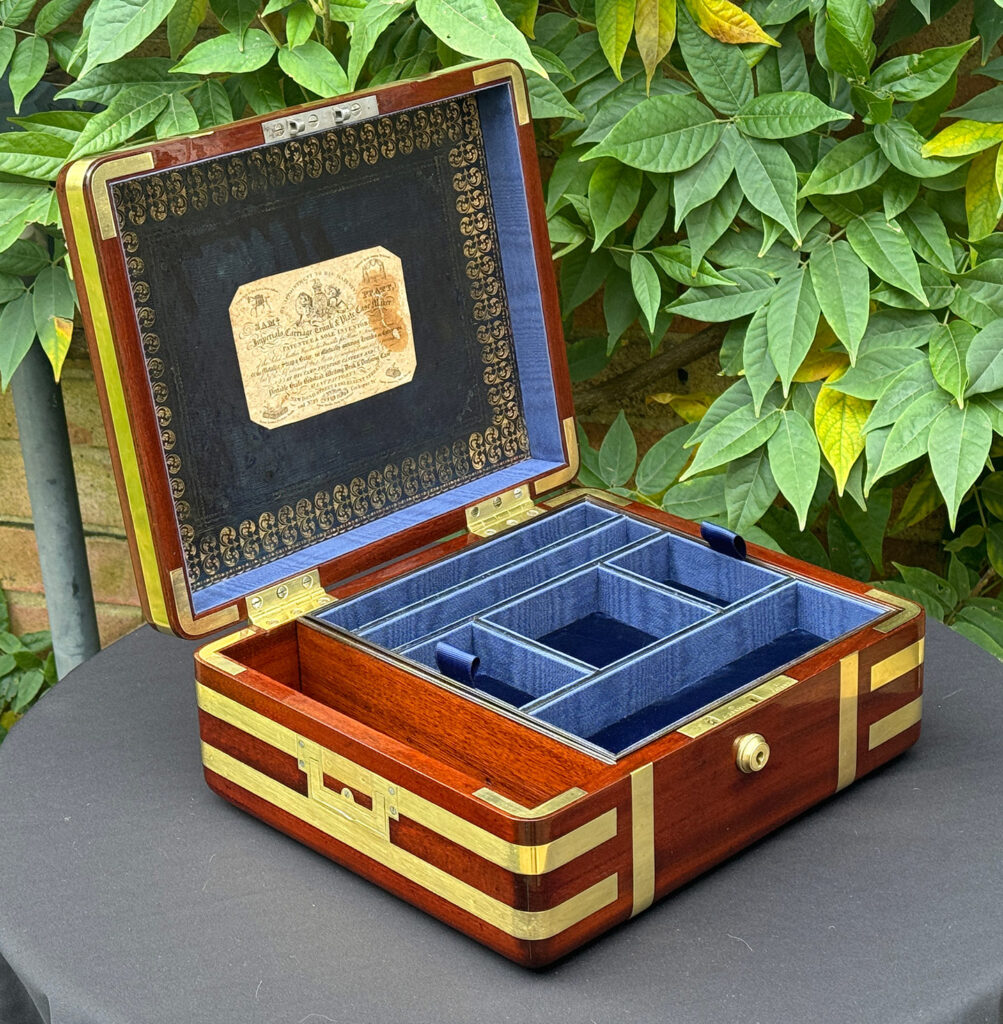 Front left internal view of an Antique Radial Edged Travelling Jewellery Box in Mahogany.