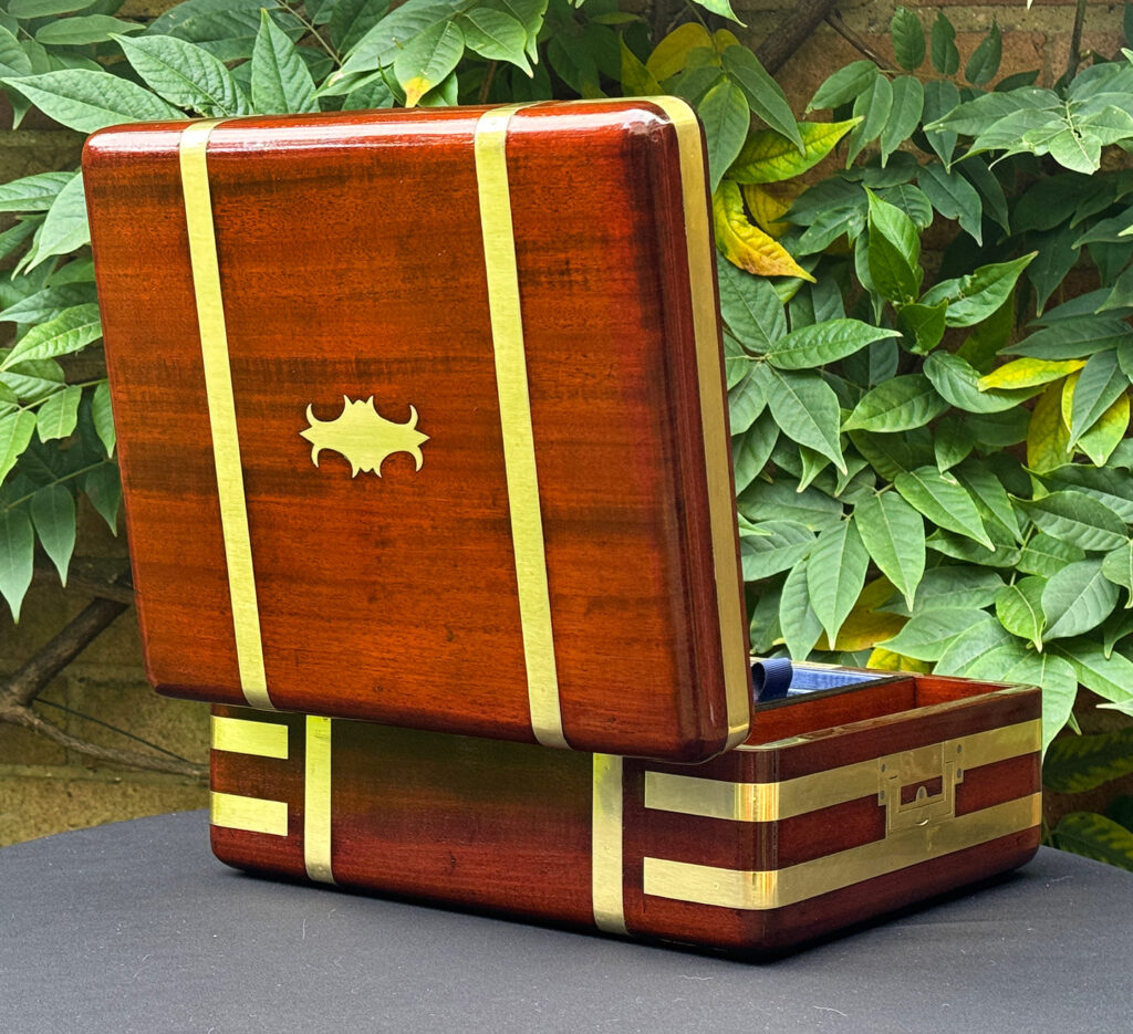 Rear open view of an Antique Radial Edged Travelling Jewellery Box in Mahogany.