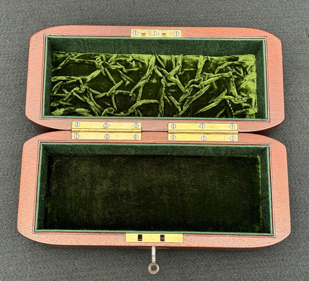 Overhead internal view of an Antique Radial Edged Jewellery Box in Cuban Mahogany.