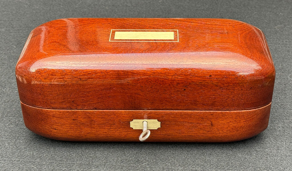 Front view of an Antique Radial Edged Jewellery Box in Cuban Mahogany.