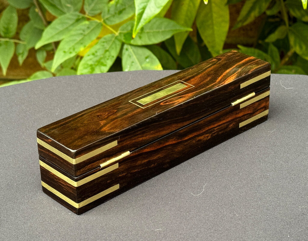 Rear right view of an Antique Miniature Pocket Jewellery Box in Calamander.
