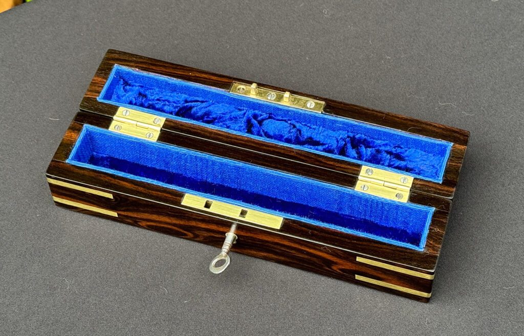 Overhead internal view of an Antique Miniature Pocket Jewellery Box in Calamander.