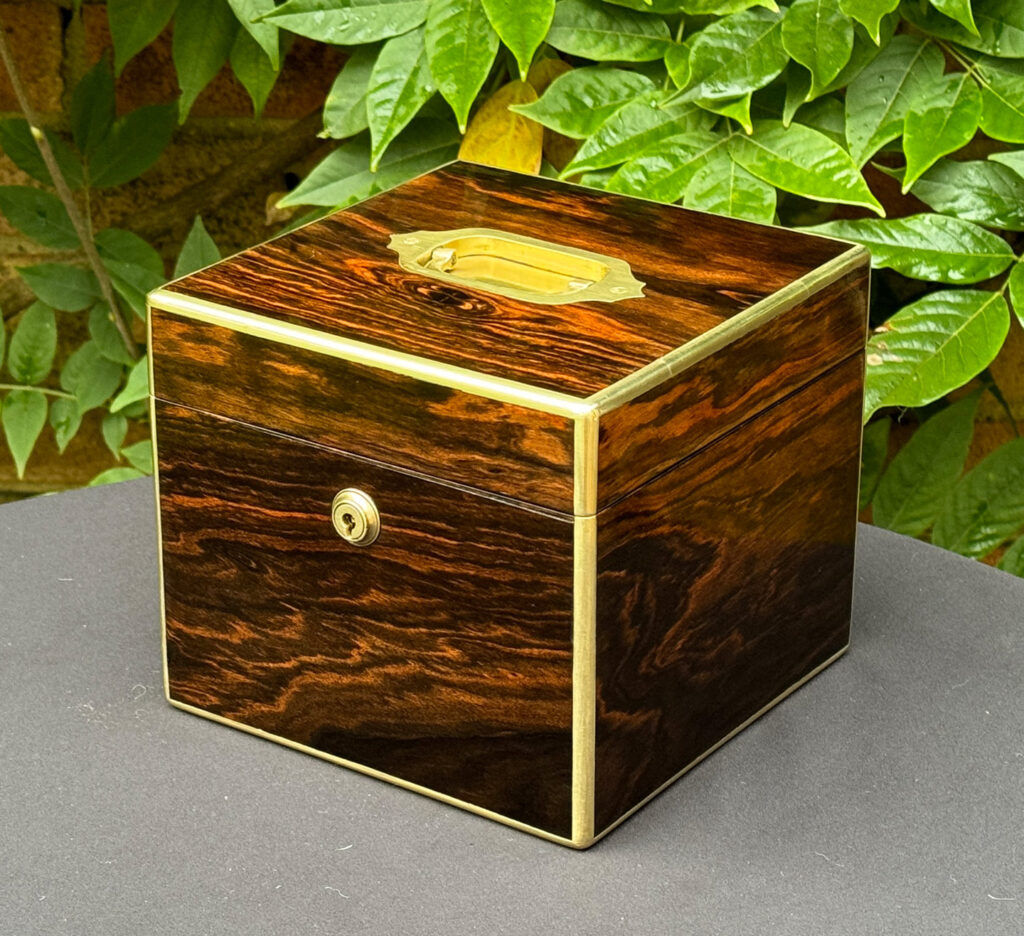 Front right view of an Antique Miniature Coromandel Cubed Jewellery Box.