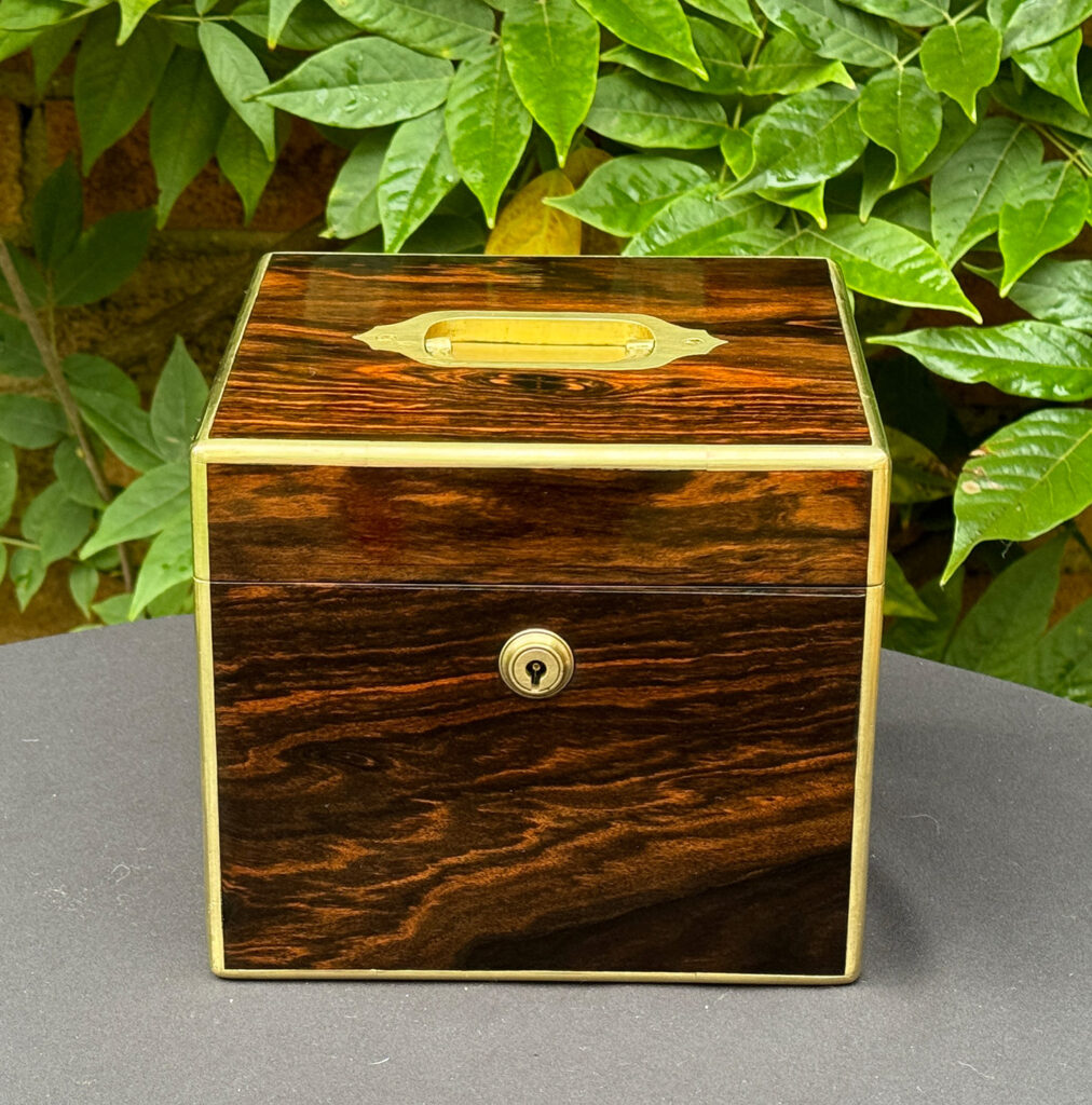 Front view of an Antique Miniature Coromandel Cubed Jewellery Box.