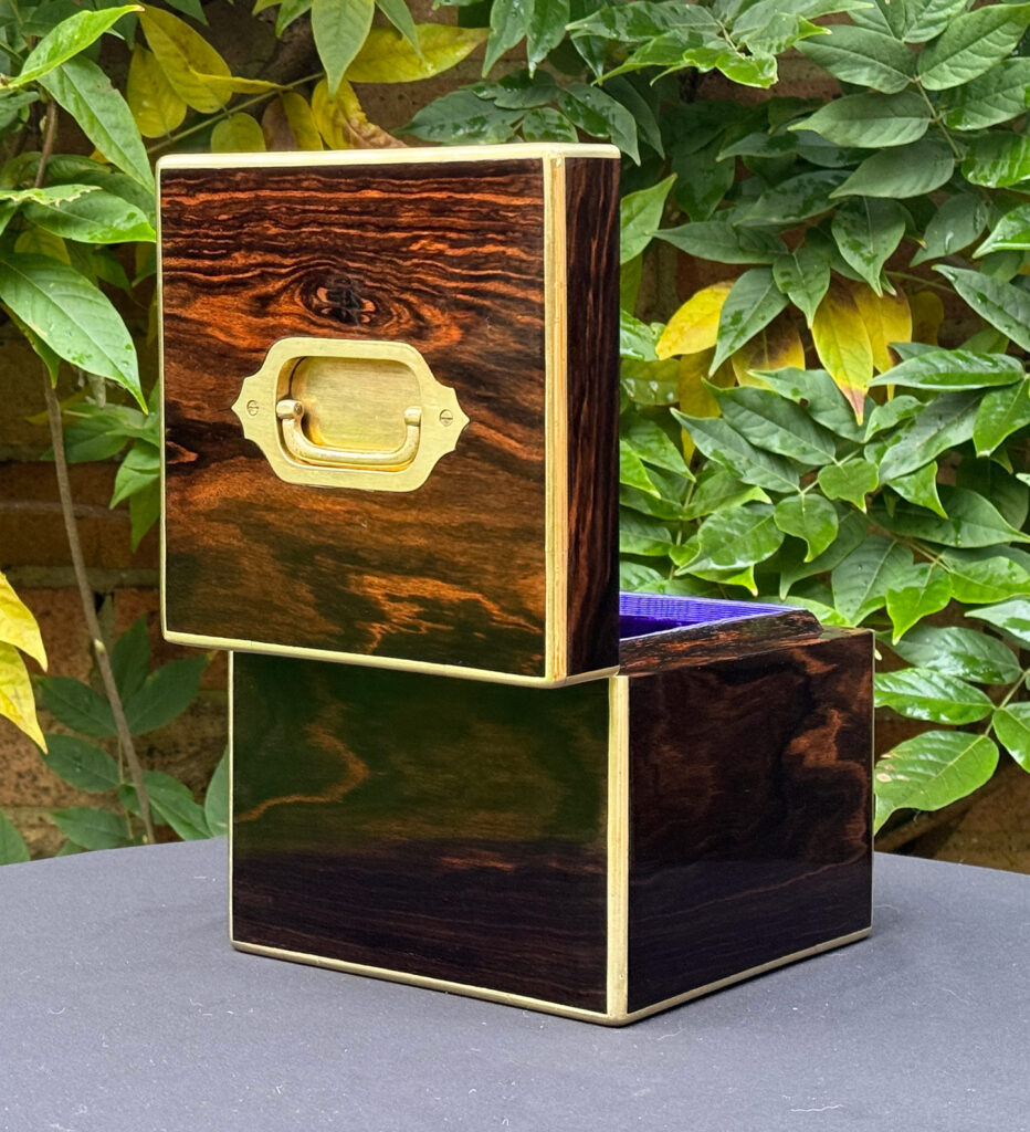 Rear open view of an Antique Miniature Coromandel Cubed Jewellery Box.