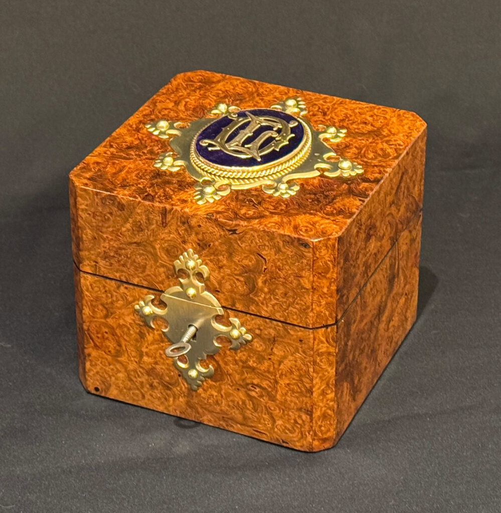 Front right view of a Miniature Antique Jewellery Box in Burr Walnut.