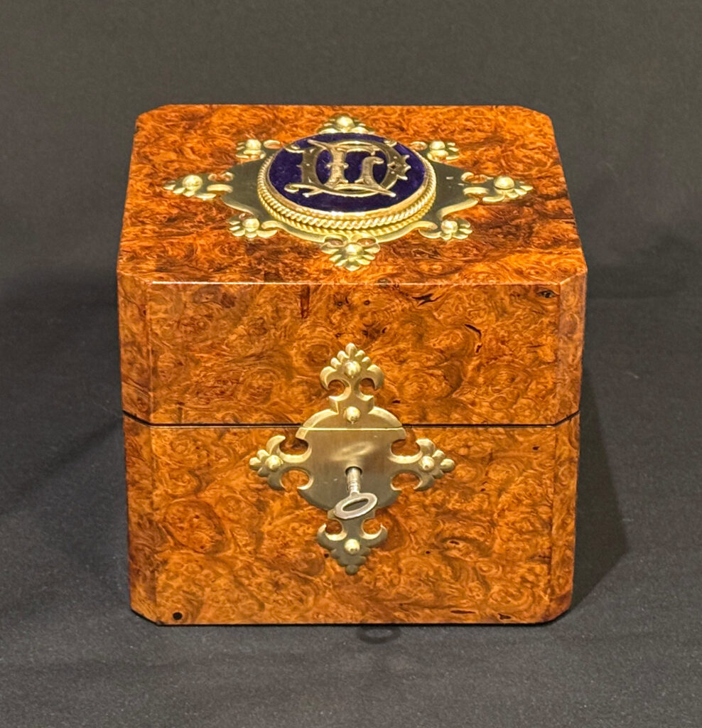 Front view of a Miniature Antique Jewellery Box in Burr Walnut.
