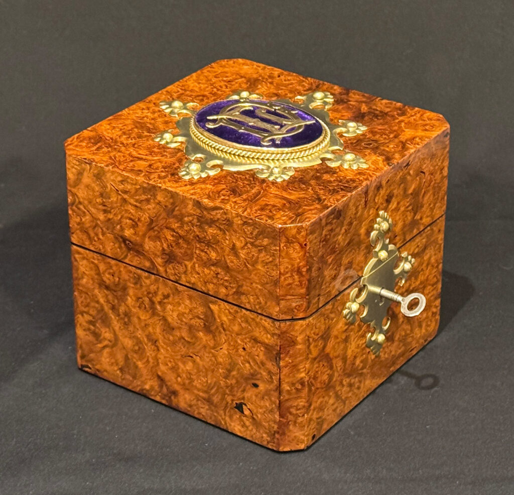 Left side view of a Miniature Antique Jewellery Box in Burr Walnut.