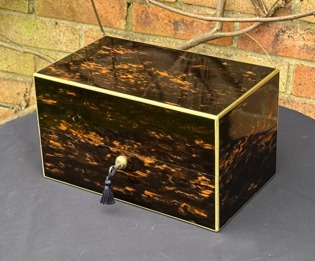 Front right view of an Antique 180-Degree Opening Travelling Jewellery Box in Coromandel.