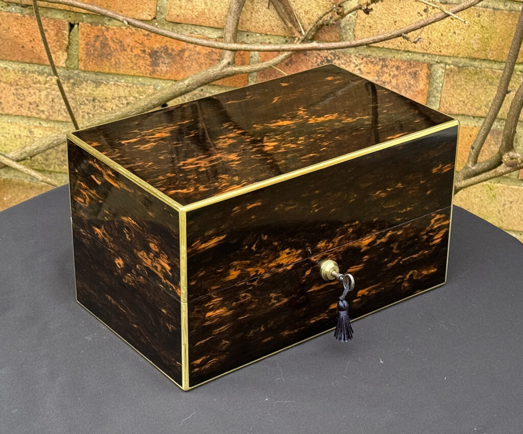 Front left view of an Antique 180-Degree Opening Travelling Jewellery Box in Coromandel.