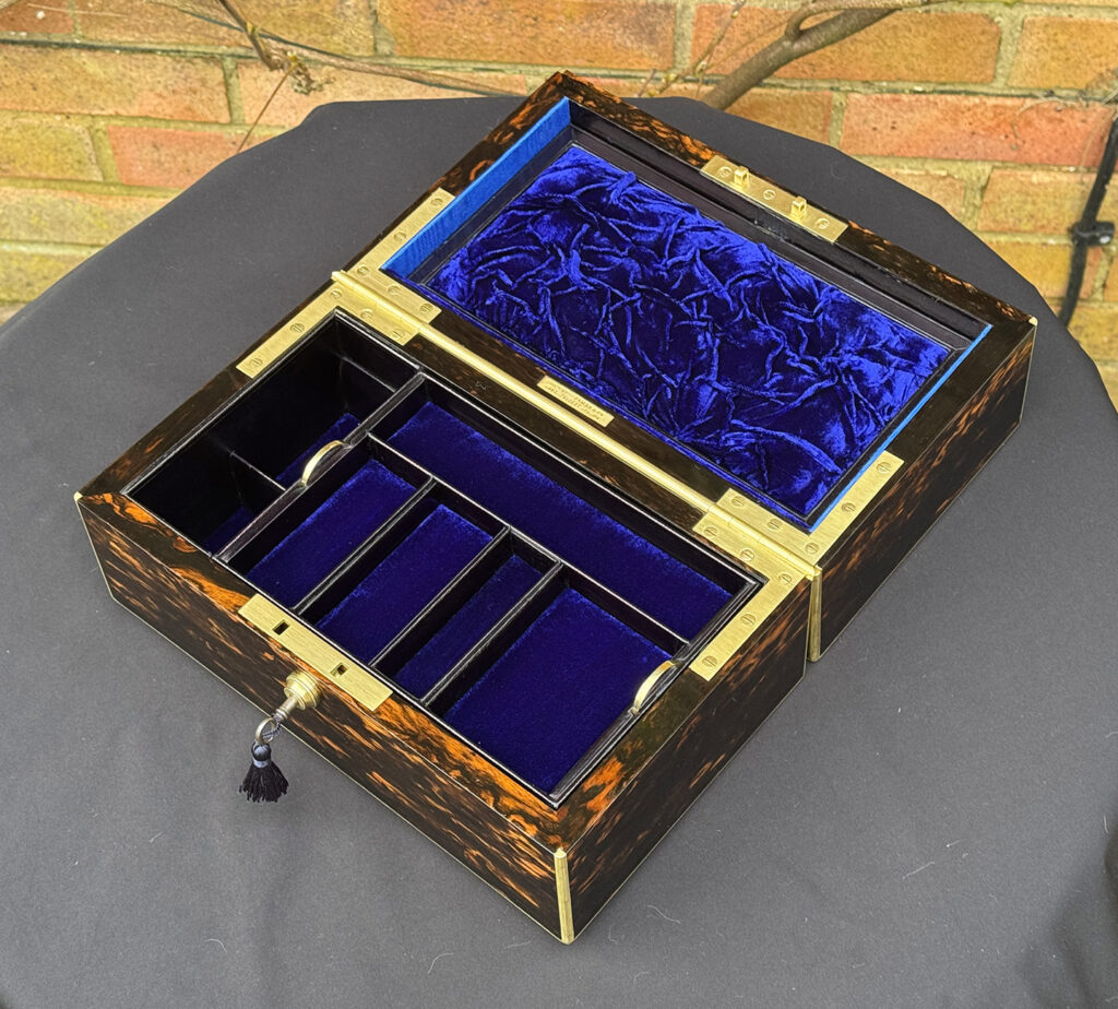 Overhead internal view of an Antique 180-Degree Opening Travelling Jewellery Box in Coromandel.