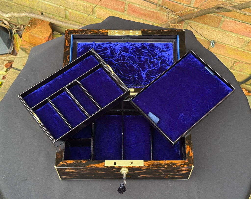 Top internal view of an Antique 180-Degree Opening Travelling Jewellery Box in Coromandel with trays removed.