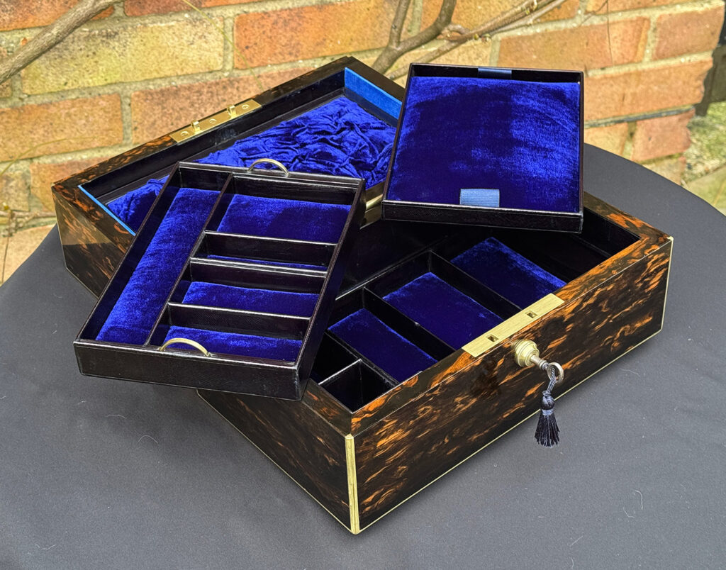 Front left internal view of an Antique 180-Degree Opening Travelling Jewellery Box in Coromandel with trays removed.
