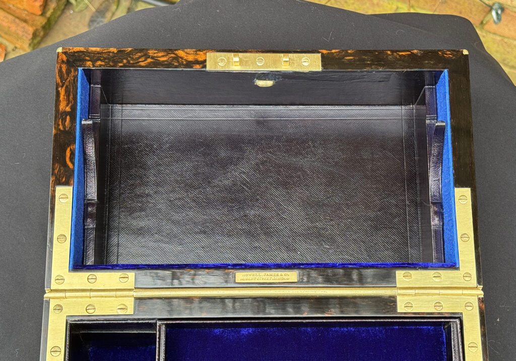 Close up of mirror panel removed from an Antique 180-Degree Opening Travelling Jewellery Box in Coromandel.