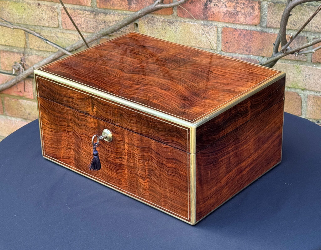 Front right view of an Antique Jewellery Box in Rosewood, by Edwards.