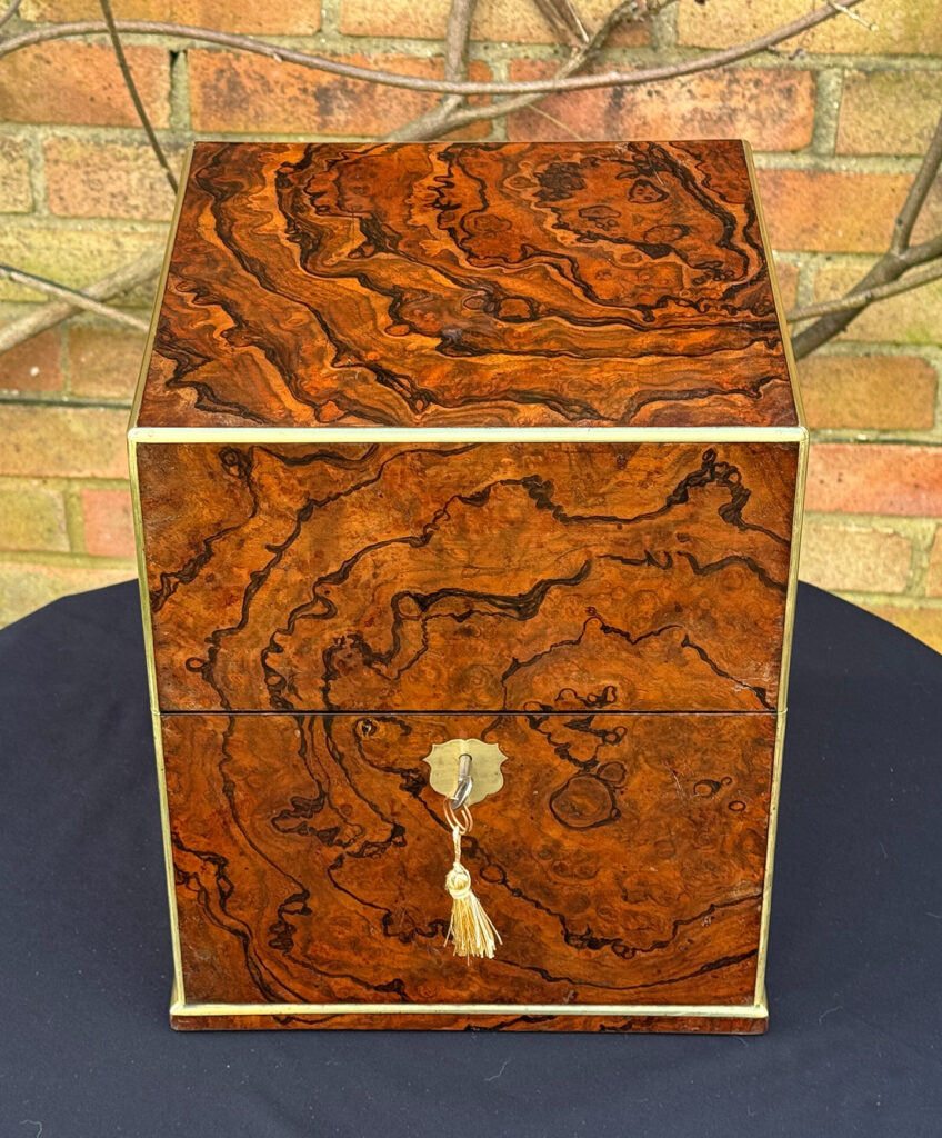 Overhead view of an Antique Jewellery Box in Figured Walnut, by George Betjemann and Sons.