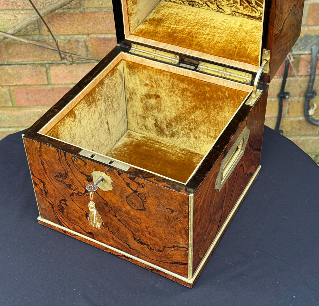 Overhead internal view of an Antique Jewellery Box in Figured Walnut, by George Betjemann and Sons.