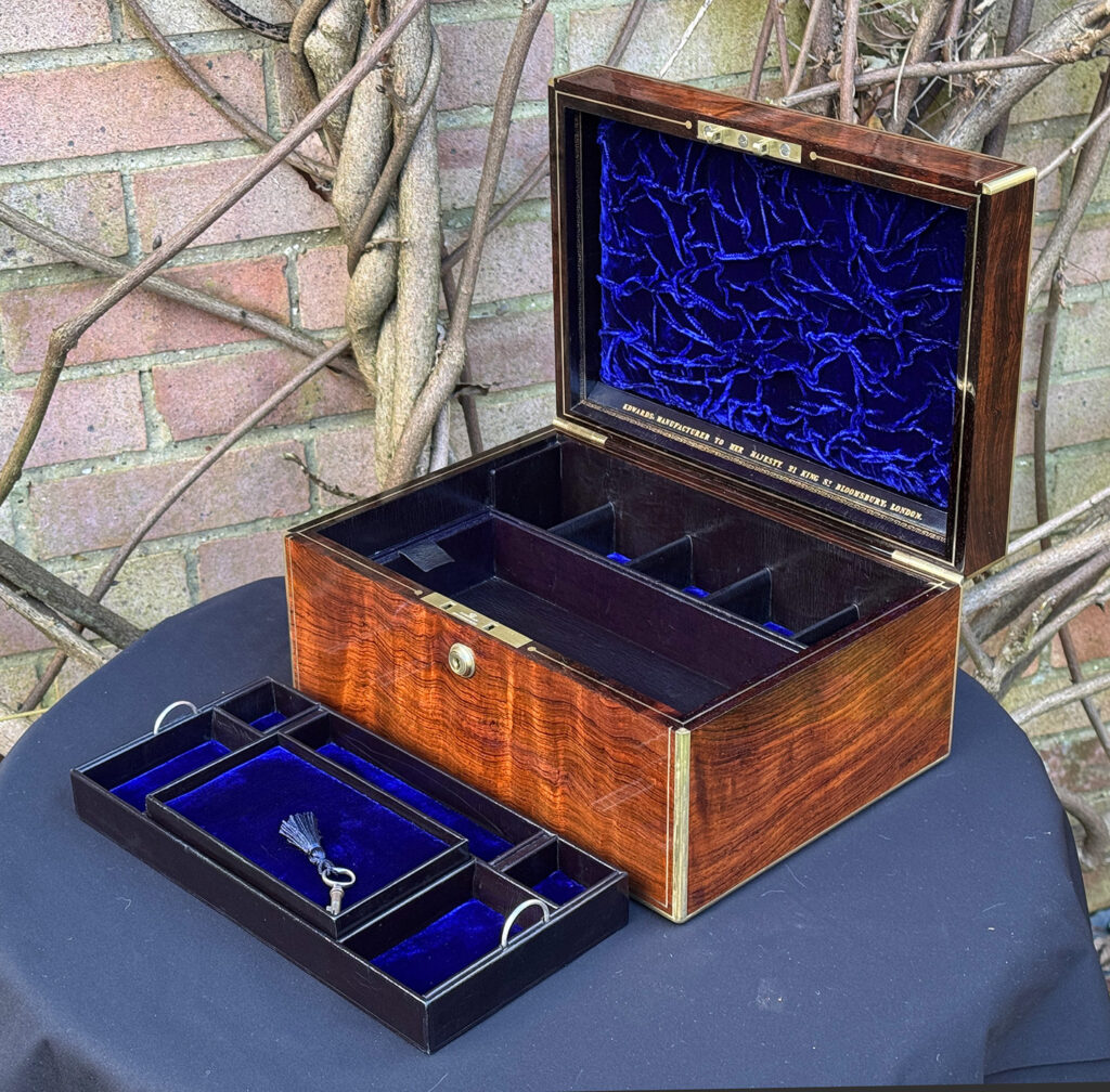 Front right internal view of an Antique Jewellery Box in Rosewood, by Edwards with top tray removed.