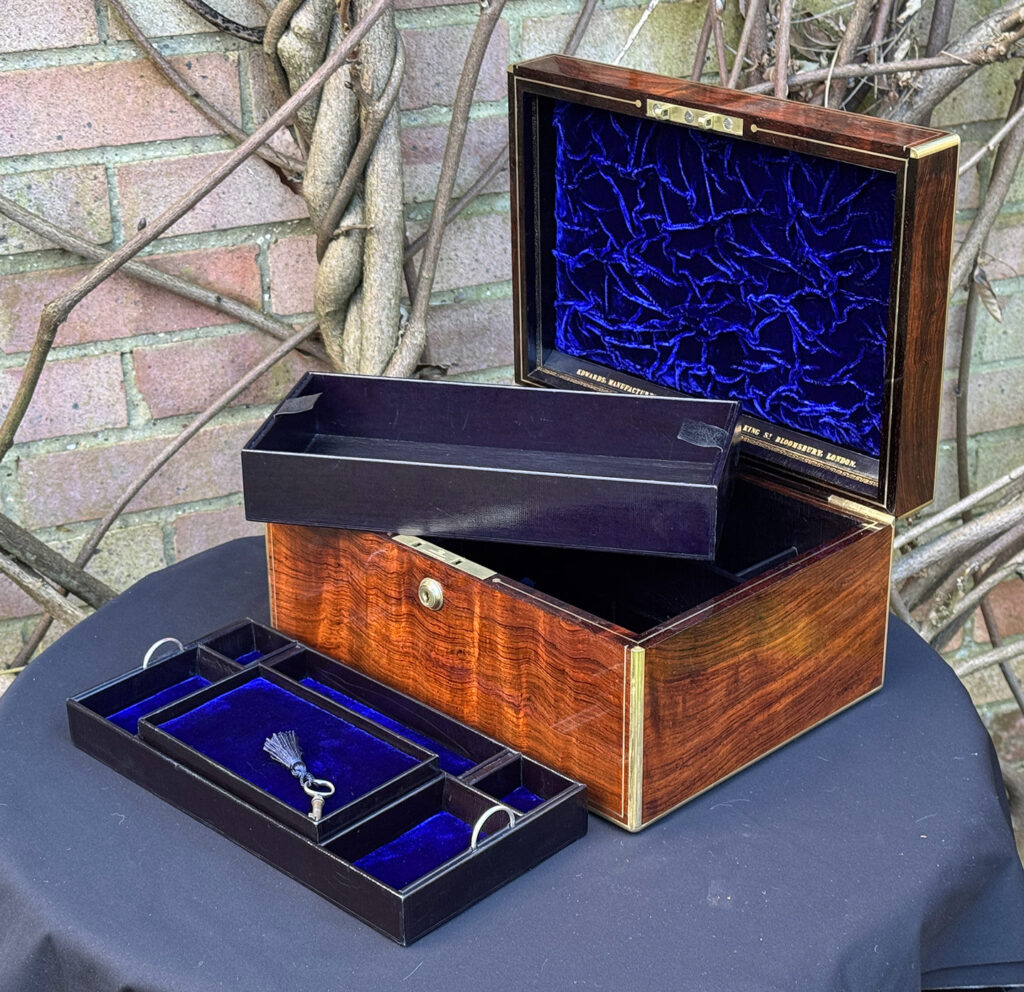 Front right internal view of an Antique Jewellery Box in Rosewood, by Edwards with leather trays removed.