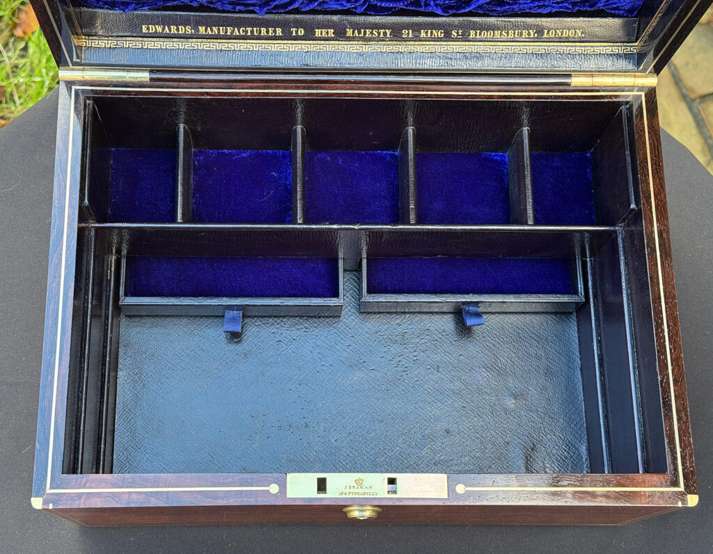 Close up internal view of the base section of an Antique Jewellery Box in Rosewood, by Edwards.