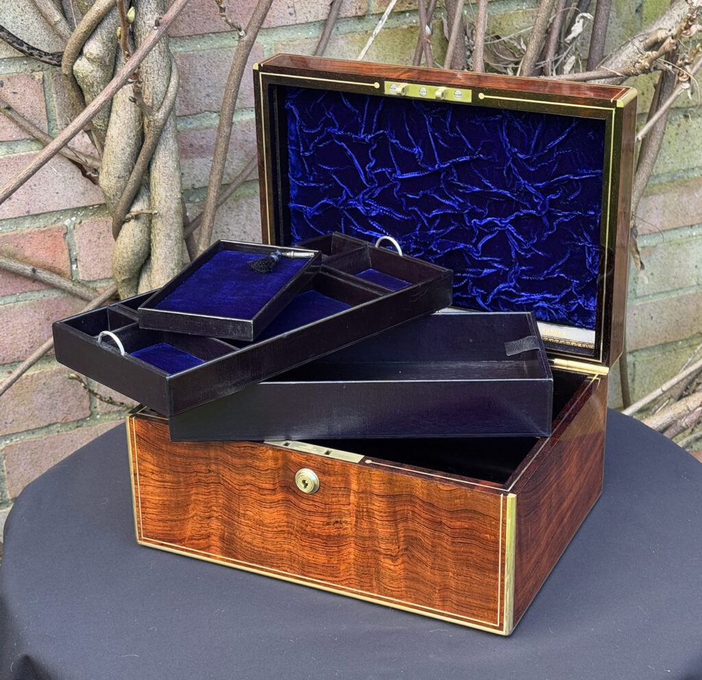 Front right internal view of an Antique Jewellery Box in Rosewood, by Edwards with trays removed.