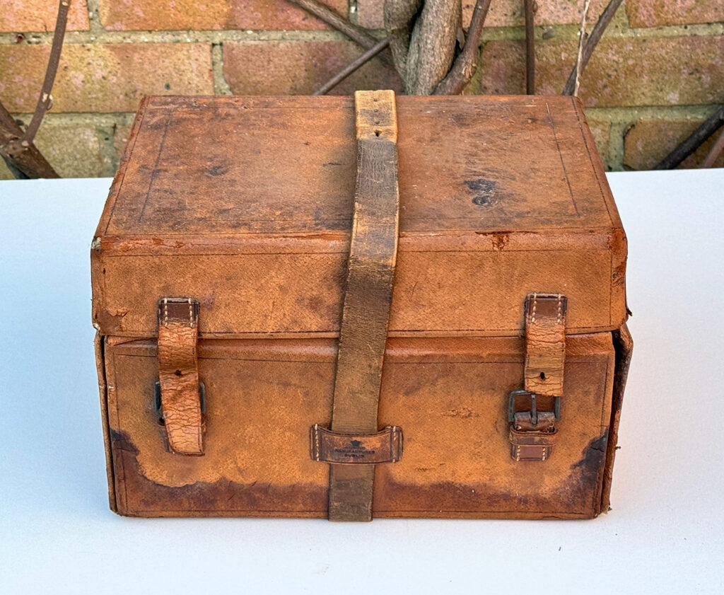 Leather outer case containing an Antique Jewellery Box in Calamander, by Austin of Dublin.