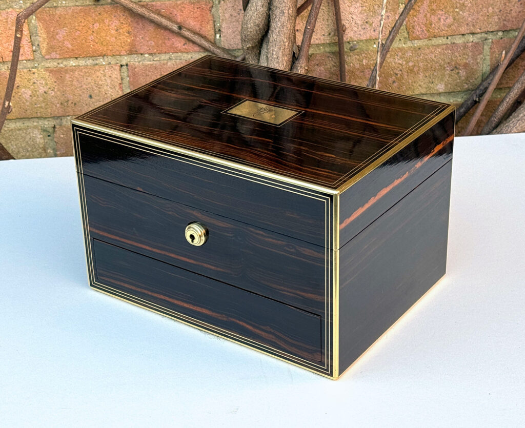 Front right view of an Antique Jewellery Box in Calamander, by Austin of Dublin.