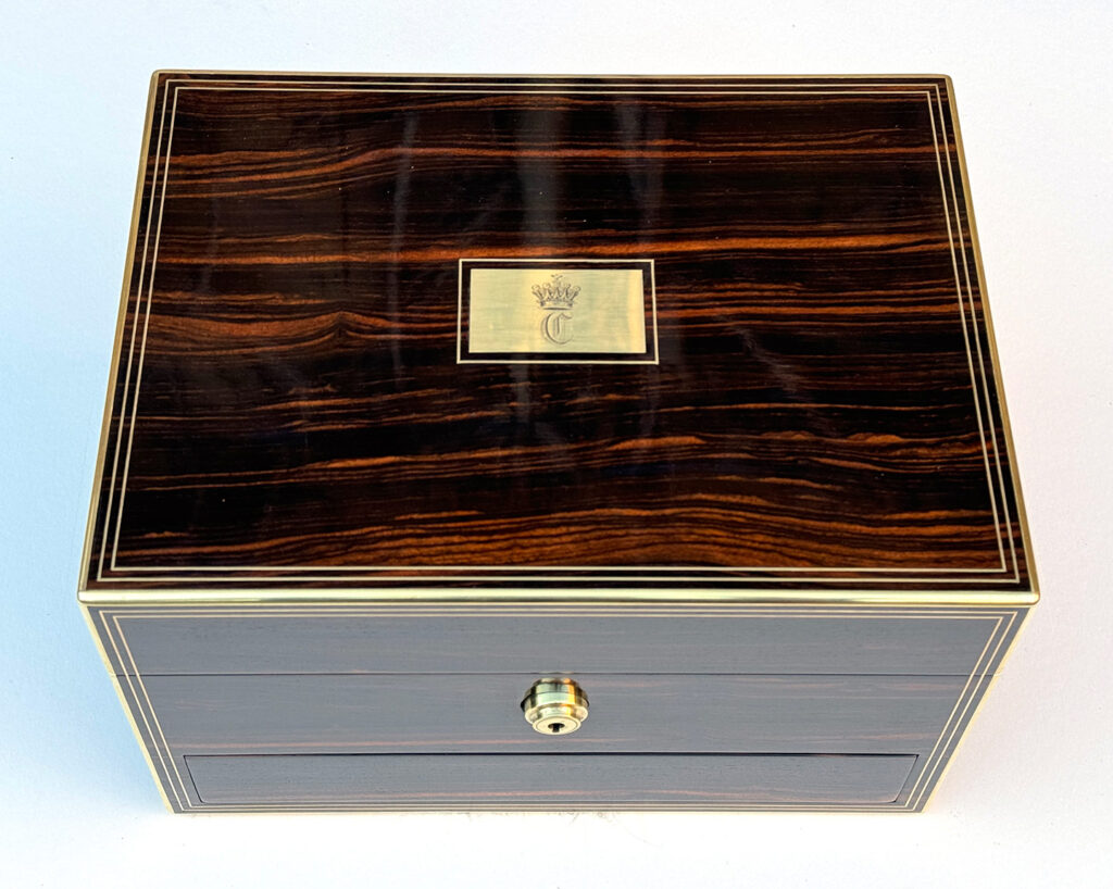 Top view of an Antique Jewellery Box in Calamander, by Austin of Dublin.