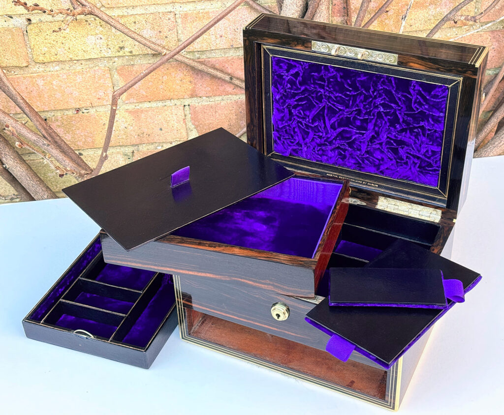 View of an Antique Jewellery Box in Calamander, by Austin of Dublin with all contents removed.