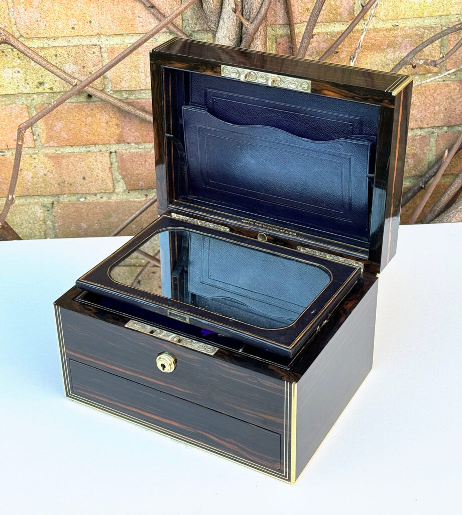Front right internal view of an Antique Jewellery Box in Calamander, by Austin of Dublin with mirror removed.