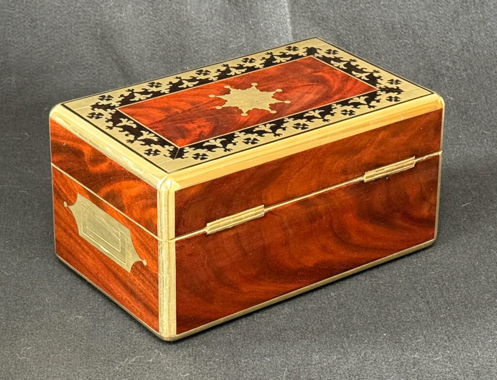 Rear right view of an Antique Miniature Jewellery Box in Flame Mahogany with Brass & Ebony Inlay.
