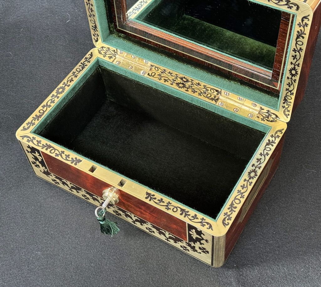 Closer overhead view of an Antique Miniature Jewellery Box in Flame Mahogany with Brass & Ebony Inlay.