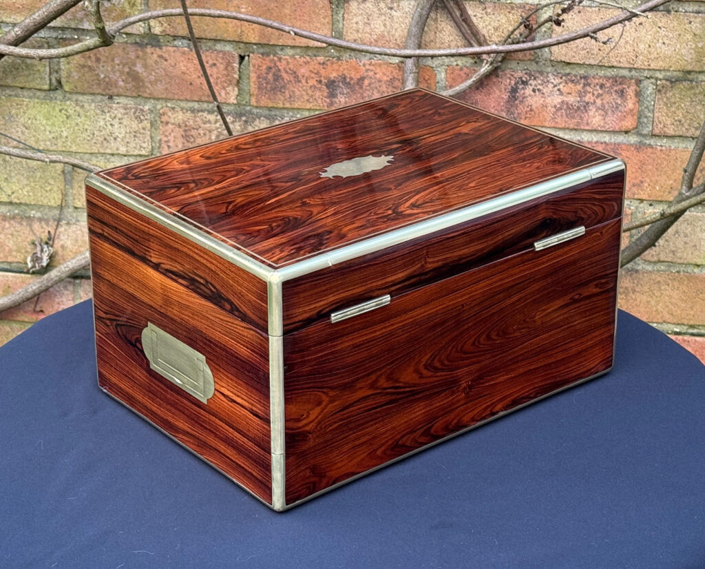 Rrear right view of an Antique Jewellery Box in Kingwood, by Green of Oxford Street.